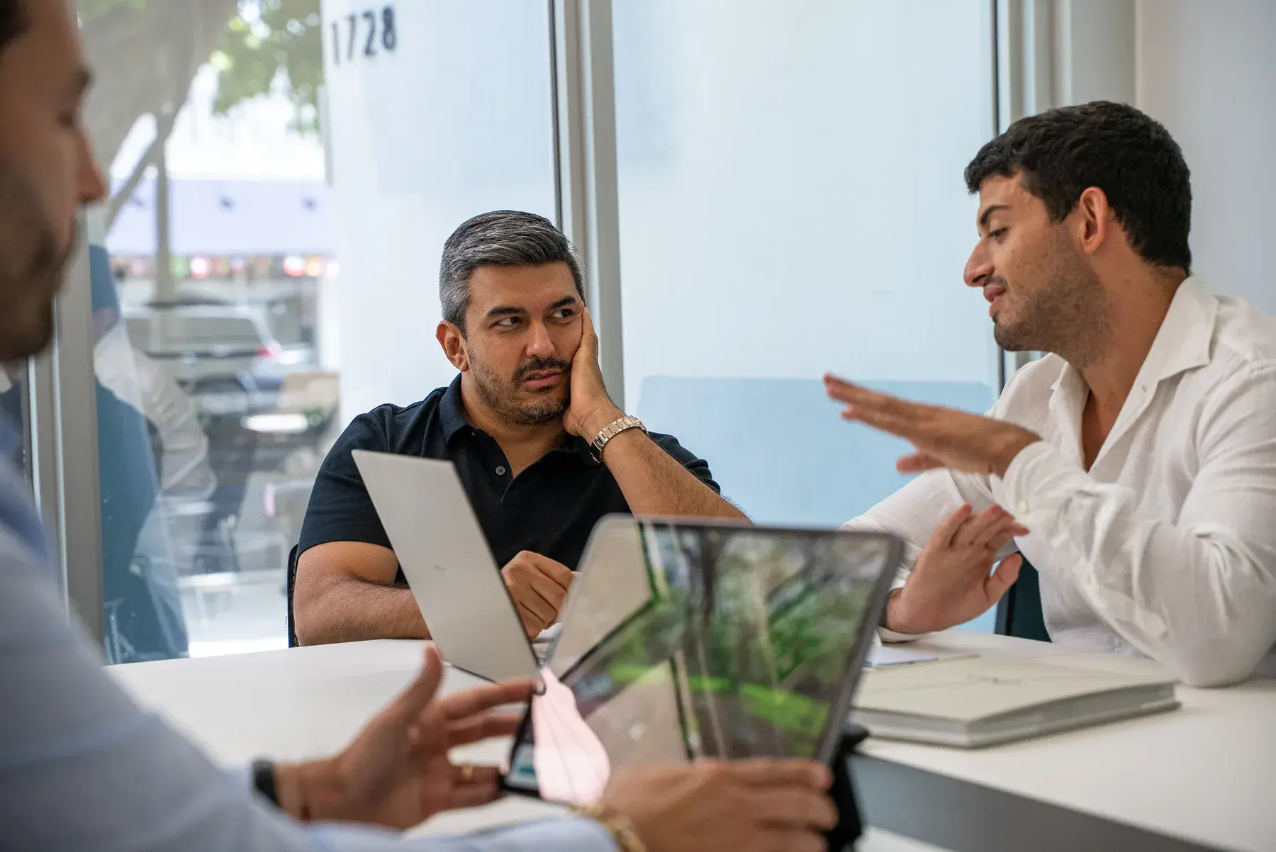 Solano Group founders reviewing development plans together